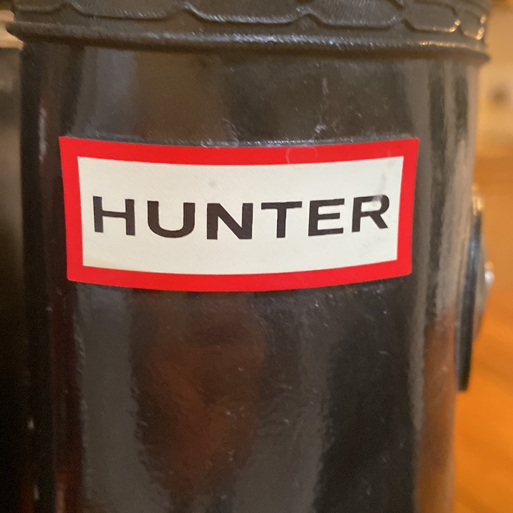 Beautiful Tall Hunter boots in black.  Worn once.  Excellent condition.
